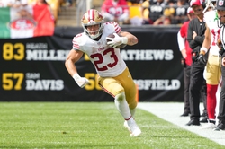 Sep 10, 2023; Pittsburgh, Pennsylvania, USA; San Francisco 49ers running back Christian McCaffrey (23) runs with the ball against the Pittsburgh Steelers during the second half at Acrisure Stadium. Mandatory Credit: Gregory Fisher-USA TODAY Sports