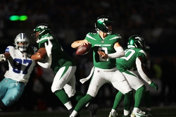 Sep 17, 2023; Arlington, Texas, USA; New York Jets quarterback Zach Wilson (2) throws a pass in the fourth quarter against the Dallas Cowboys at AT&T Stadium. Mandatory Credit: Tim Heitman-USA TODAY Sports