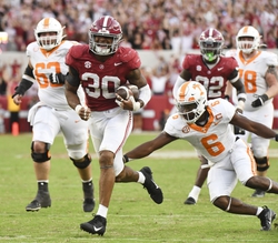 Oct 21, 2023; Tuscaloosa, Alabama, USA; Alabama Crimson Tide linebacker Jihaad Campbell (30) recovers a fumble and runs it in for a touchdown against Tennessee as Tennessee Volunteers linebacker Aaron Beasley (6) attempts to tackle him at Bryant-Denny Stadium. Alabama defeated Tennessee 34-20. Mandatory Credit: Gary Cosby Jr.-USA TODAY Sports