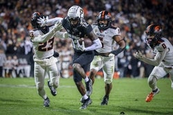 Nov 4, 2023; Boulder, Colorado, USA; Colorado Buffaloes cornerback Travis Hunter (12) breaks past Oregon State Beavers defensive back Jermod McCoy (23) at Folsom Field. Mandatory Credit: Chet Strange-USA TODAY Sports