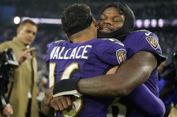 Dec 10, 2023; Baltimore, Maryland, USA;  Baltimore Ravens wide receiver Tylan Wallace (16) and quarterback Lamar Jackson (8) celebrate after Wallace's game-winning punt return touchdown in overtime against the Los Angeles Rams at M&T Bank Stadium. Mandatory Credit: Jessica Rapfogel-USA TODAY Sports