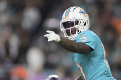 Dec 11, 2023; Miami Gardens, Florida, USA; Miami Dolphins wide receiver Tyreek Hill (10) signals from the field against the Tennessee Titans during the third quarter at Hard Rock Stadium. Mandatory Credit: Sam Navarro-USA TODAY Sports