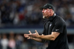 Lions coach Dan Campbell reacts to a controversial call that nullified a go-ahead two-point conversion in the Lions 20-19 loss to the Dallas Cowboys, Saturday at AT&T Stadium.