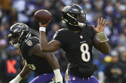 Dec 31, 2023; Baltimore, Maryland, USA; Baltimore Ravens quarterback Lamar Jackson (8) throws during the first quarter against the Miami Dolphins at M&T Bank Stadium. Mandatory Credit: Tommy Gilligan-USA TODAY Sports