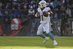 Dec 31, 2023; Baltimore, Maryland, USA;  Miami Dolphins quarterback Tua Tagovailoa (1) throws during the first half against the Baltimore Ravens at M&T Bank Stadium. Mandatory Credit: Tommy Gilligan-USA TODAY Sports