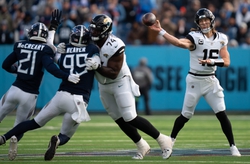 Jacksonville Jaguars quarterback Trevor Lawrence (16) throws against the Tennessee Titans during their game at Nissan Stadium in Nashville, Tenn., Sunday, Jan. 7, 2024.