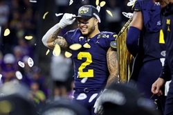 Jan 8, 2024; Houston, TX, USA; Michigan Wolverines running back Blake Corum (2) celebrates after beating theWashington Huskies in the 2024 College Football Playoff national championship game at NRG Stadium. Mandatory Credit: Troy Taormina-USA TODAY Sports