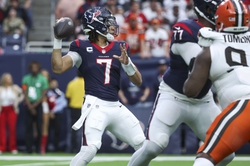 Jan 13, 2024; Houston, Texas, USA; Houston Texans quarterback C.J. Stroud (7) passes in Houston's 45-14 Wild Card win over the Cleveland Browns. Mandatory Credit: Troy Taormina-USA TODAY Sports